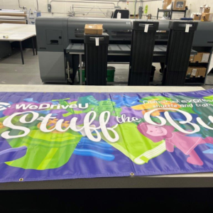 Banner Stand - WeDriveU Stuff the Bus